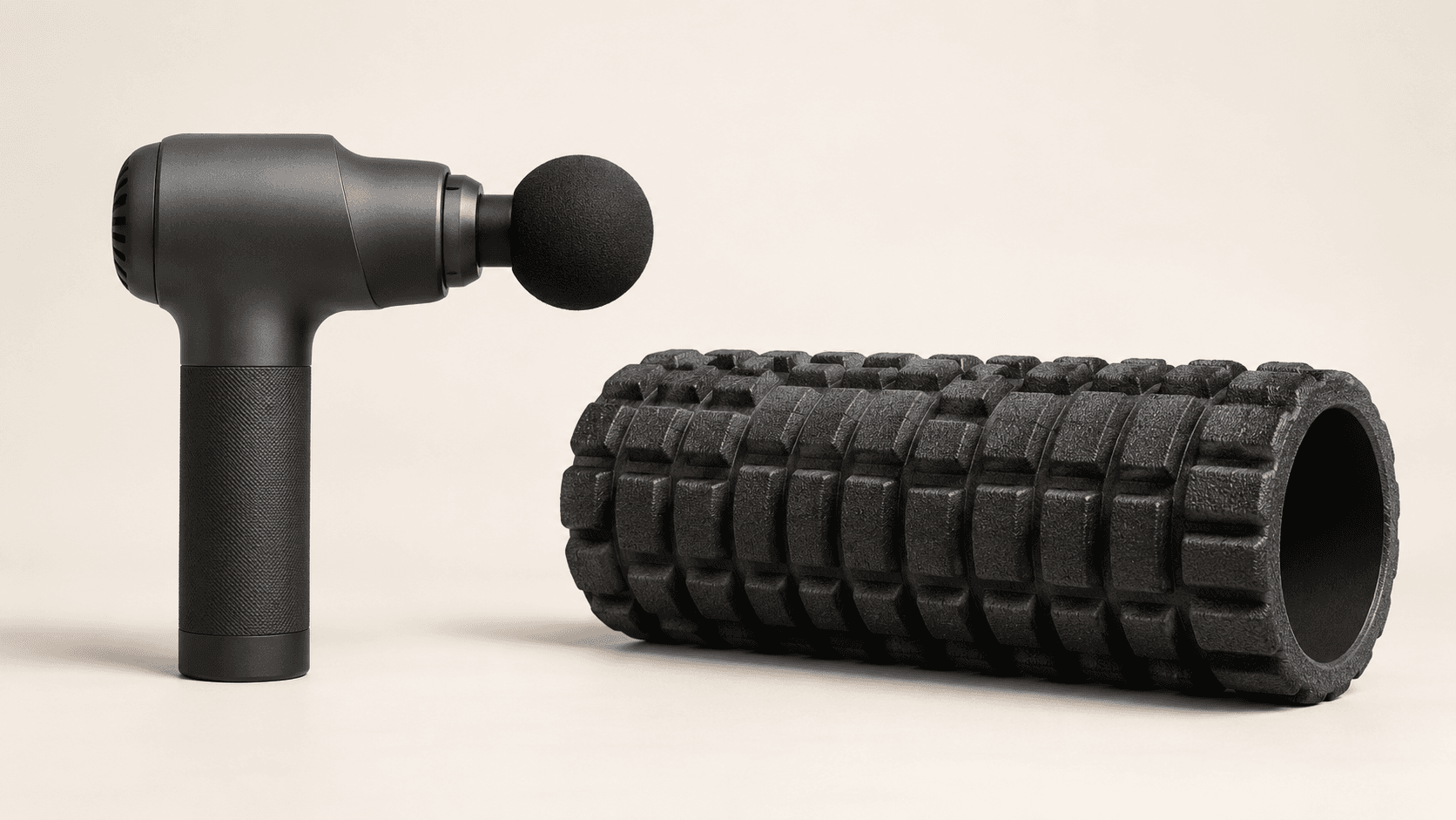 Generic percussion massager beside a textured foam roller